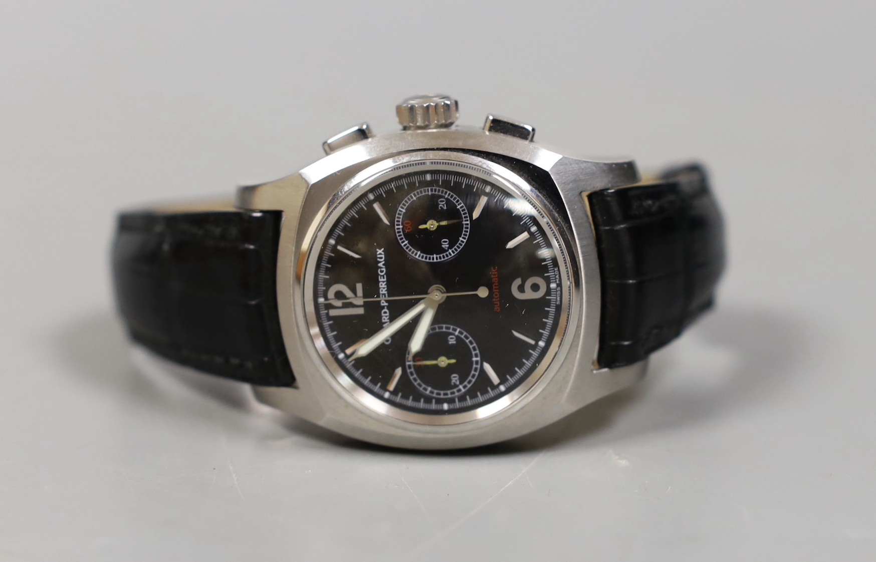 A gentleman's early 2000's stainless steel Girard Perregaux automatic chronograph wrist watch, model no. 2499, the case back engraved AN.79, with box and booklet, case diameter 39mm, on Girard Perregaux leather strap wit